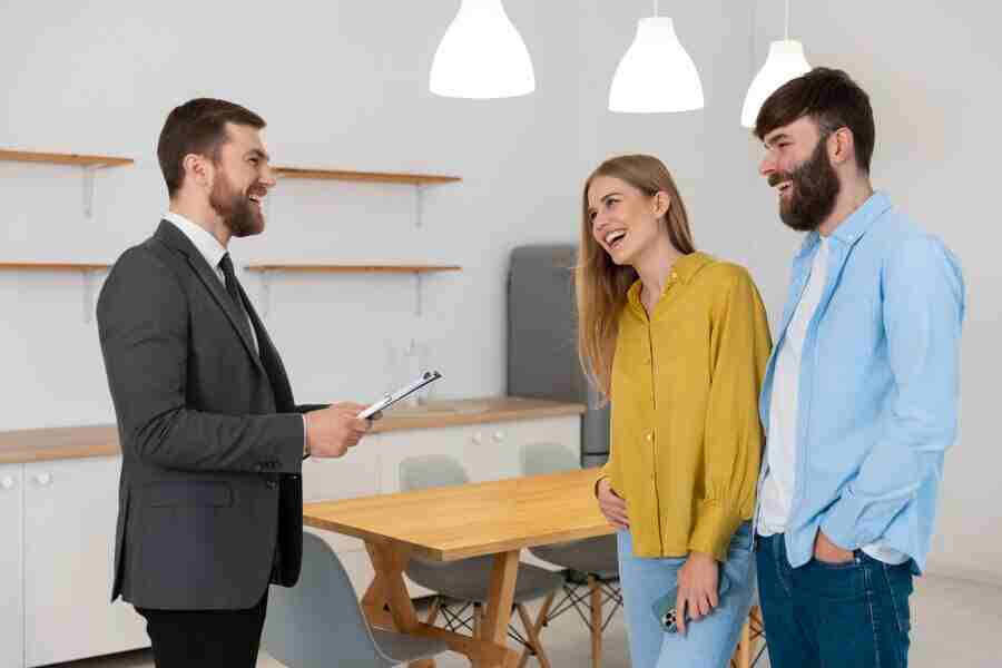 Real estate agent with clients.
