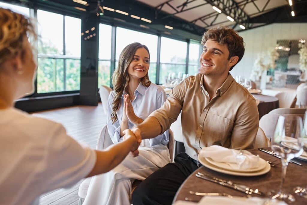 Shaking hands with a rental property owner