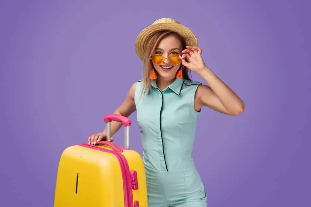 happy female tourist-looking at camera